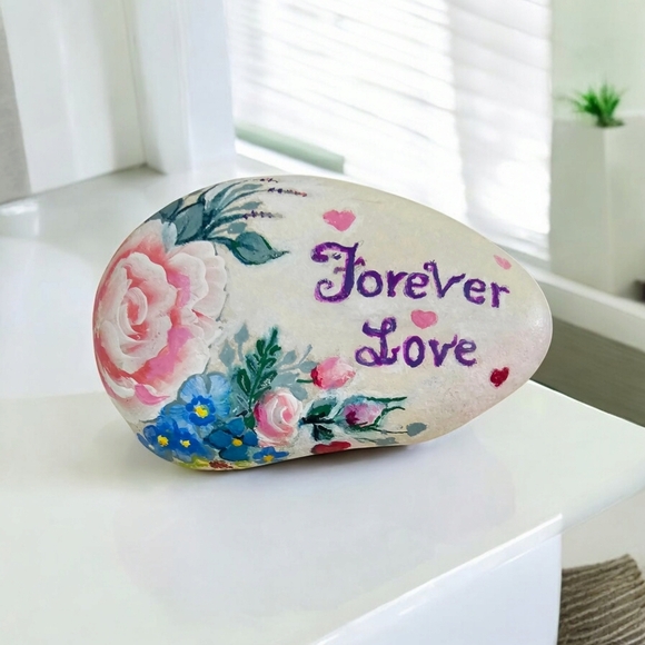 Painted LOVE river rock with rosy- peach roses, blue accent flowers, and hearts - Picture 16 of 17